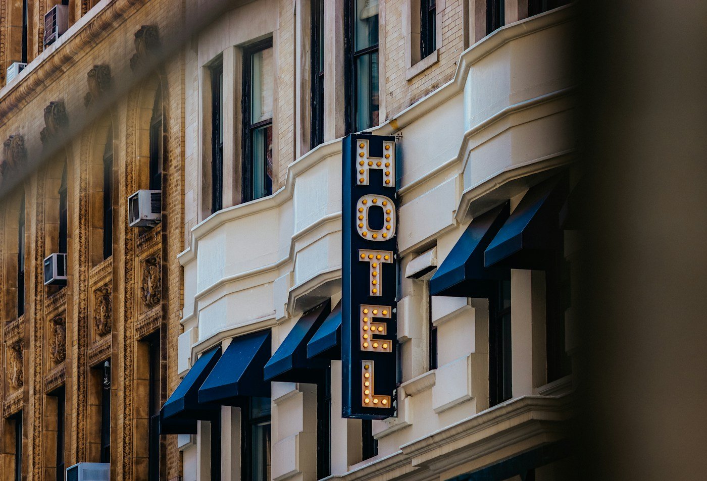 Hotel exterior with illuminated signage