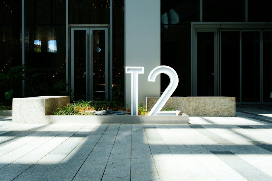 Large freestanding pylon sign near a commercial property